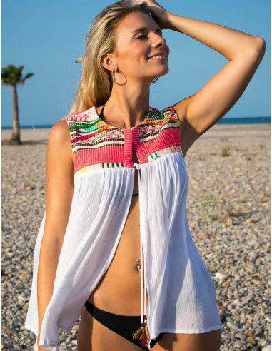 white-woman-vest-with-embroidery-on-the-chest-beach