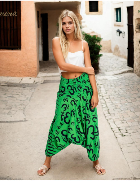 Green cotton Afghan pants with irregularly drawn Om symbols