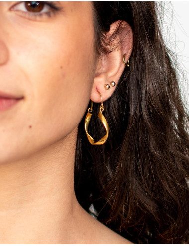 Orecchini in ottone dorato...