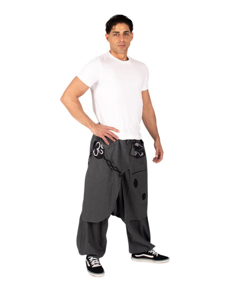 Pantaloni afghani in cotone grigio con orlo asimmetrico e simbolo Om
