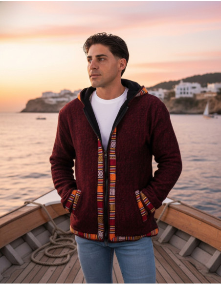 Warm red jacket with handcrafted trim in shades of red and orange